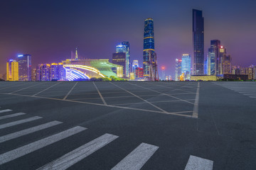 Obraz premium Road pavement and Guangzhou city buildings skyline