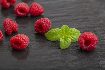 Raspberry berries on shale plate