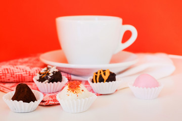 A cup of coffee and handmade truffles,