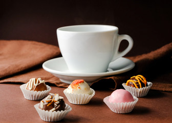 A cup of coffee and handmade truffles,