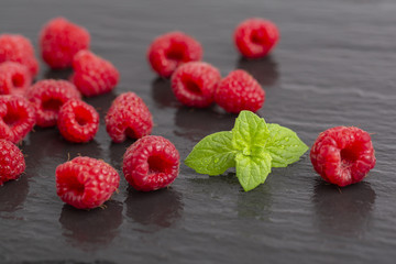 Raspberry berries on shale plate
