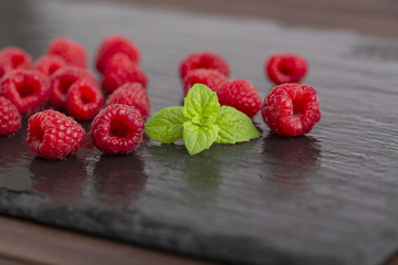 Raspberry berries on shale plate