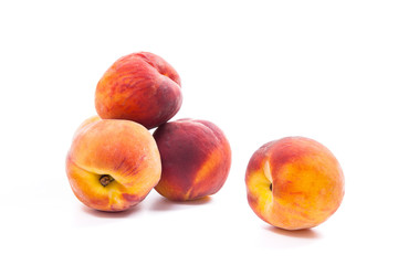 Group of ripe peach fruit isolated on white background.