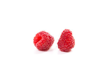 Ripe raspberries isolated on white background.
