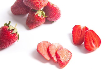 Strawberry fresh ripe sweet berry with sliced, half and whole fruits isolated on white.