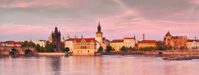 Prague, riverside on sunset in a pink glow