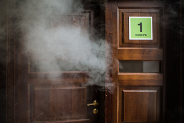 fire in the room smoke comes out of doors