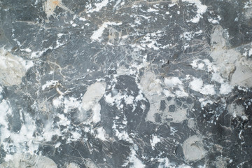 granite stone rock surface in dark grey tone with white pattern