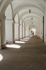 Passage between ancient houses, arches