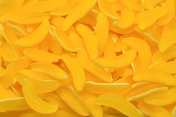 Yellow banana gummy candies. Top view. Jelly  sweets.