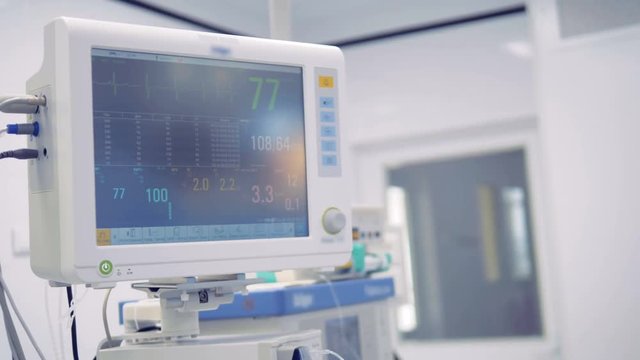 Medical monitor showing vital signs of a patient