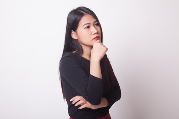 Serious  young Asian woman  look away.