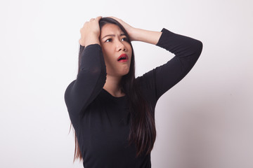 Stressed young Asian businesswoman scream out.