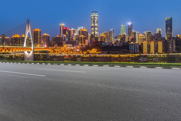 Obraz premium Road pavement and Chongqing urban architecture skyline