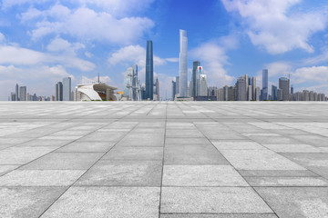 Urban skyscrapers with empty square floor tiles