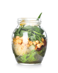 Delicious vegetable salad in mason jar on white background