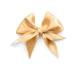 Beautiful bow made from golden ribbon on white background