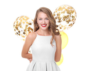 Naklejka premium Beautiful young woman with balloons on white background