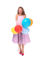 Fototapeta premium Beautiful young woman with balloons on white background