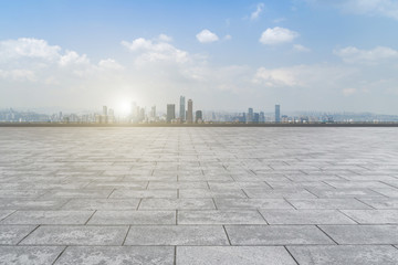 Urban skyscrapers with empty square floor tiles