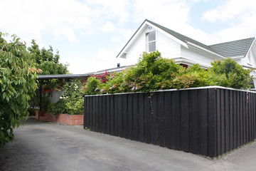 home with black fence