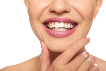 Beautiful young woman with pink lipstick on white background, closeup