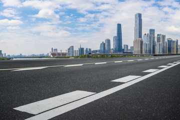 Fototapeta premium Road pavement and Guangzhou city buildings skyline