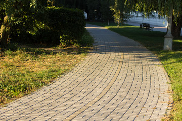 park outdoor cycle road near city waterfront river shore line district in sun rise morning time