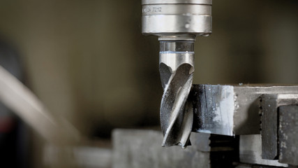 Detail of drilling machine bits in a high precision mechanics plant.