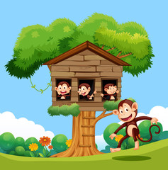Obraz na płótnie Canvas Monkey playing at treehouse