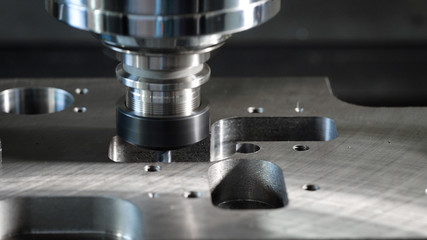 Close-up shot of a milling cutting machine in process.