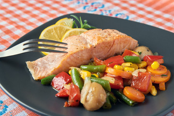 Grilled salmon with mexican vegetables