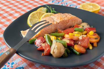 Grilled salmon with mexican vegetables