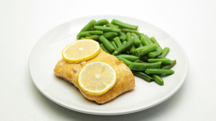 Delicious Cooked Salmon Fish Fillets with Arugula