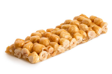 Hazelnut snack bar isolated on white.