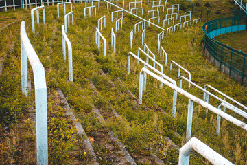Open air seating with railing at a sport stadium
