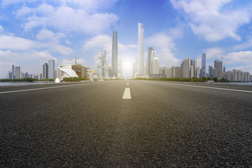 Obraz premium Road pavement and Guangzhou city buildings skyline