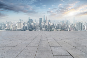 Urban skyscrapers with empty square floor tiles