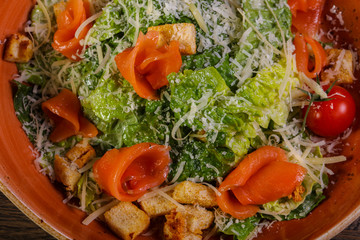 Caesar salad with salmon