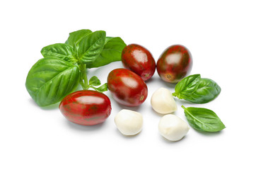 Delicious tomatoes, mozzarella cheese and fresh basil on white background