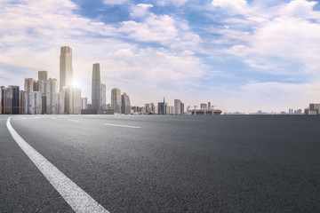 Road pavement and Guangzhou city buildings skyline