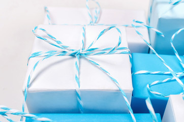 blue and white gift boxes with ribbon