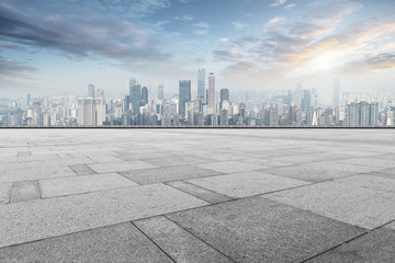 Urban skyscrapers with empty square floor tiles