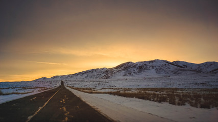 Fototapeta na wymiar Beautiful sunset on Mongolian roads