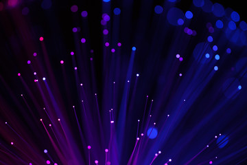 Abstract background a Optical fiber lamp. Closeup of colorful optical fibers