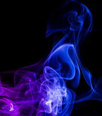 Obraz premium Colored smoke on black background