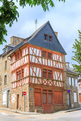 Fototapeta na wymiar Beautiful cityscape of an ancient traditional house with wooden beams in Saint-Brieuc, in the Côtes-d'Armor department in Brittany, France 