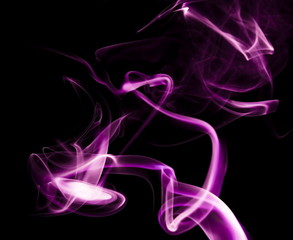 Purple smoke on black background