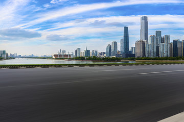 Fototapeta premium Road pavement and Guangzhou city buildings skyline