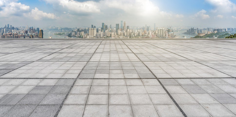 Urban skyscrapers with empty square floor tiles